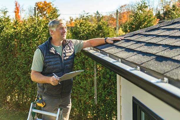 Professional Flat Roof Repair technician working in Hume, MO